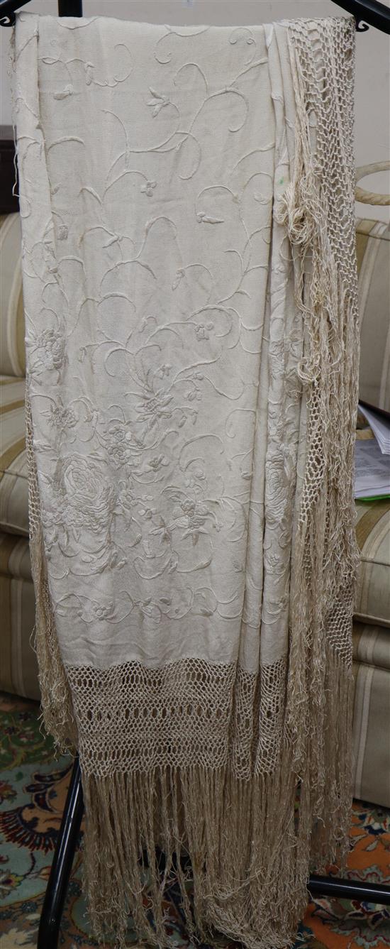 A cream on cream Chinese silk embroidered shawl